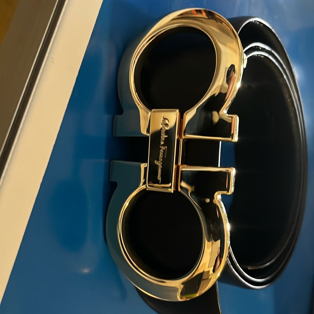 Ferragamo black belt with gold buckle